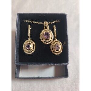 Gold tone necklace with matching earrings